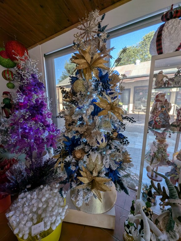 Designer Christmas tree in blue and gold