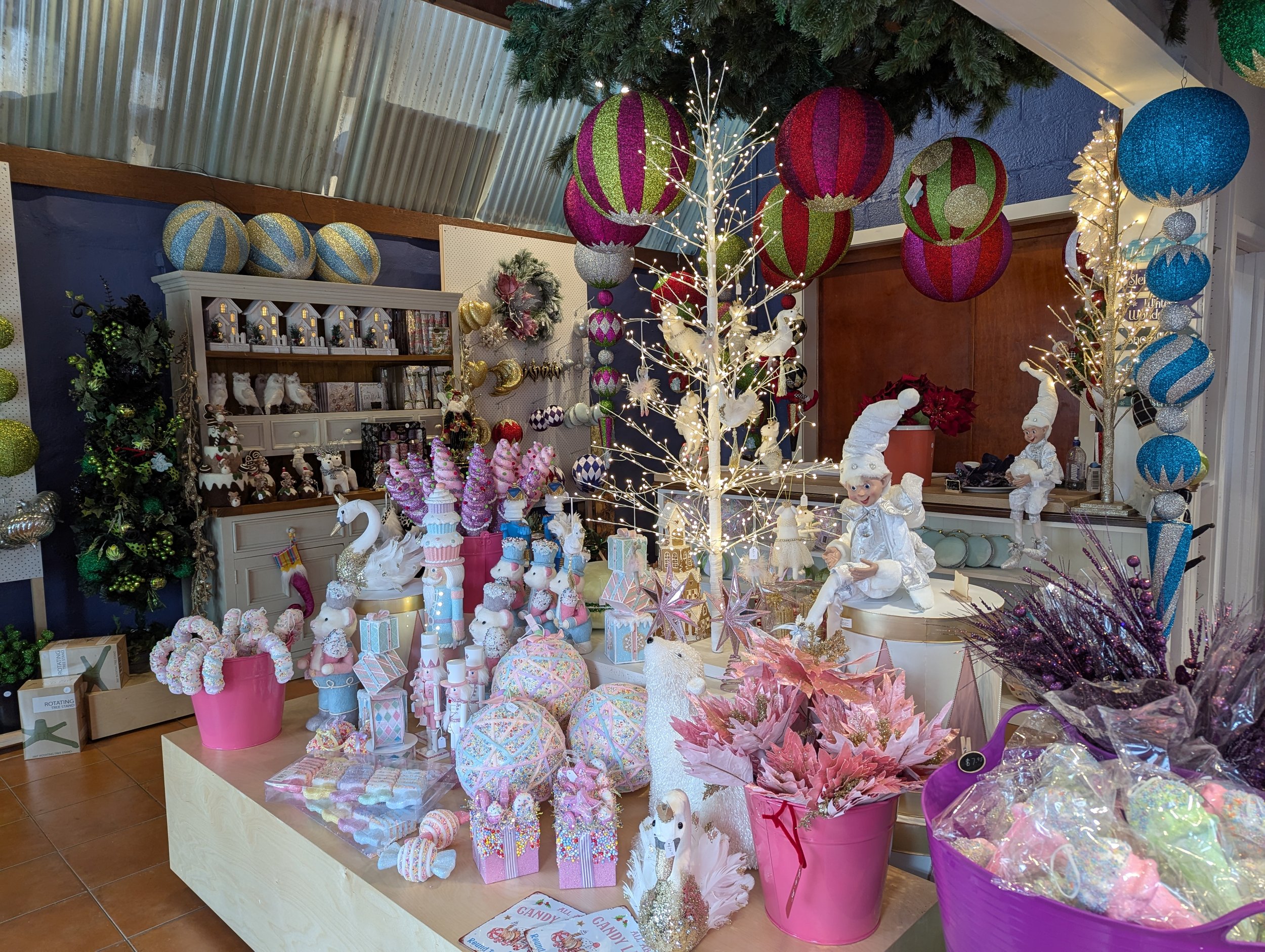 Inside the Santa's Secret workshop, filled with colourful decorations